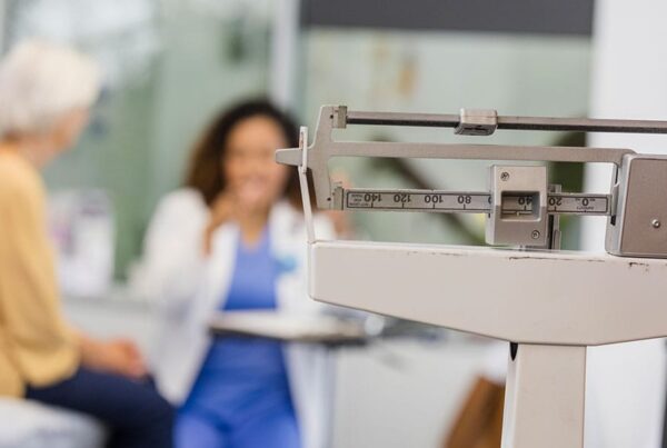 woman and her doctor in New Jersey discussing "weigh-in" anxiety