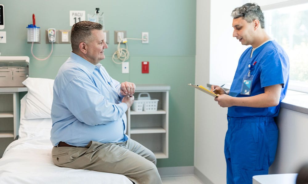 man speaking with his bariatric surgeon in New Jersey