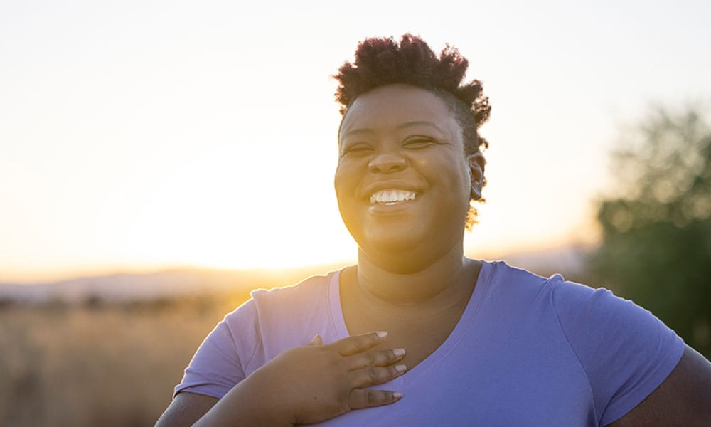 woman smiling after her bariatric surgery in New Jersey