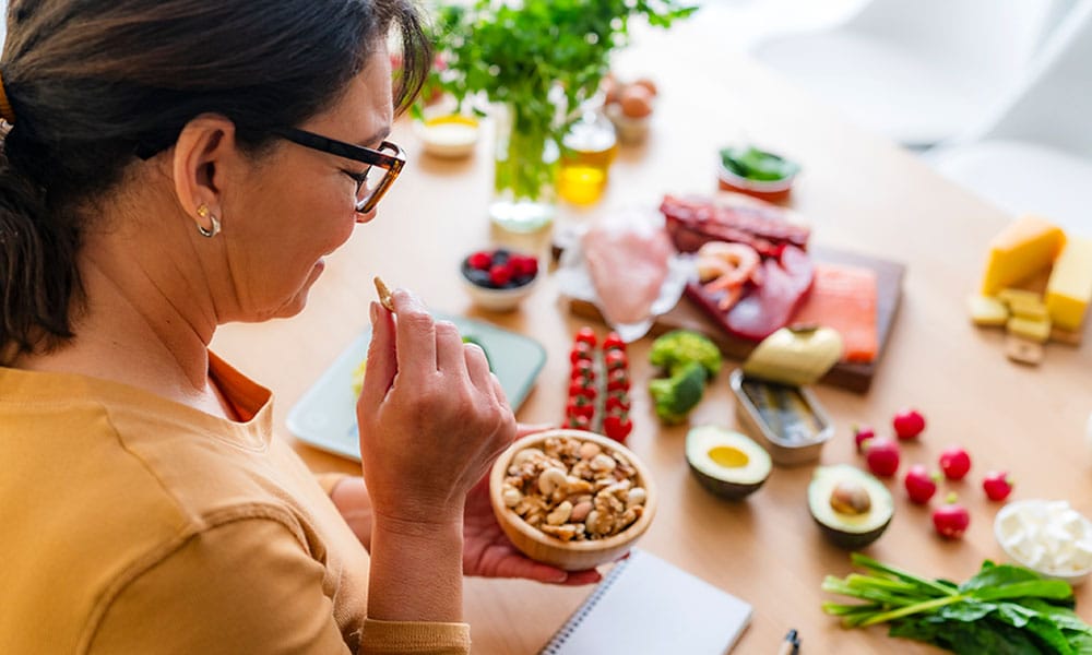older obese woman making a healthy meal in New Jersey