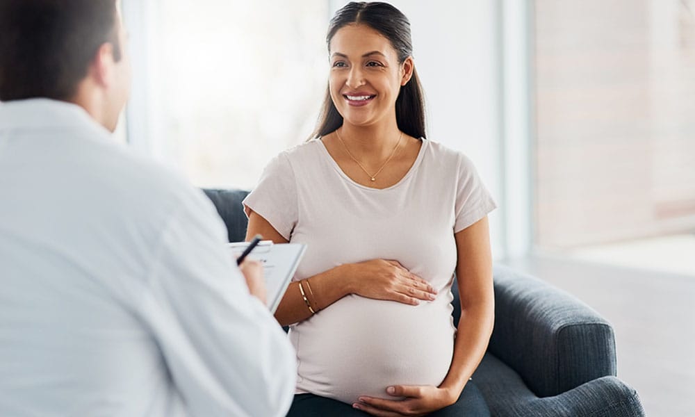 woman and her doctor discussing her pregnancy after her bariatric surgery in New Jersey